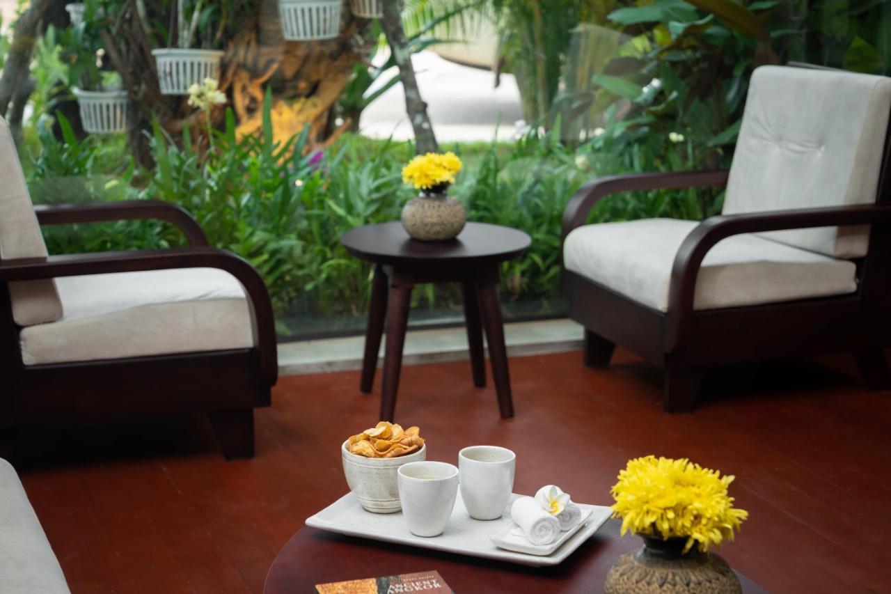 Eightfold Urban Resort 暹粒 外观 照片 A room at the hotel
