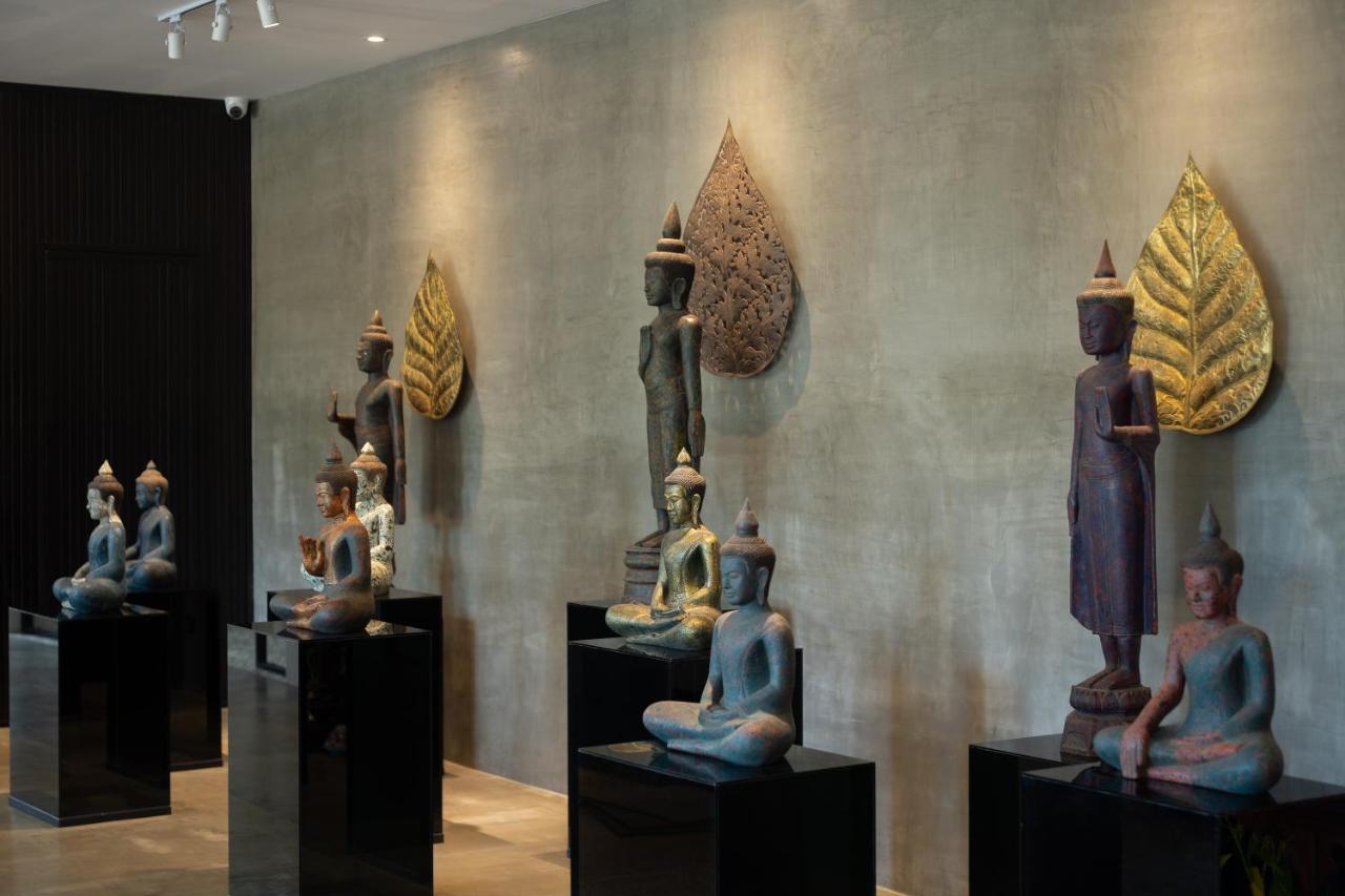 Eightfold Urban Resort 暹粒 外观 照片 A collection of Thai and Laotian art