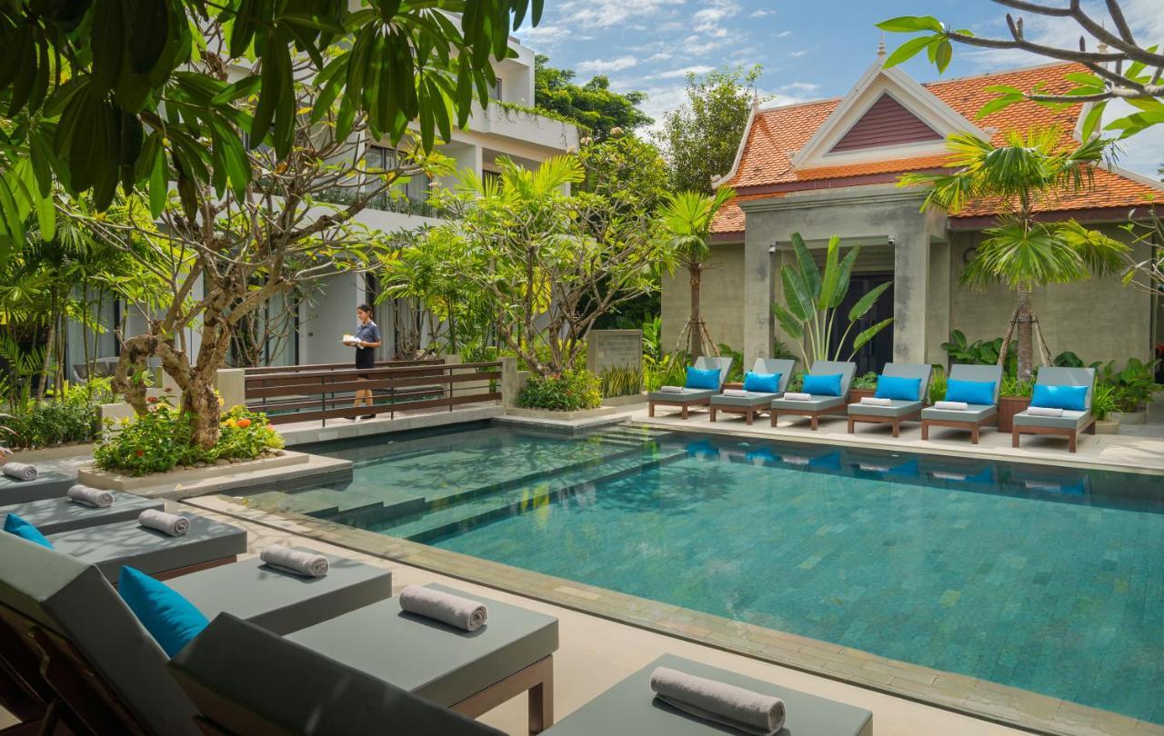 Eightfold Urban Resort 暹粒 外观 照片 The swimming pool at The Library