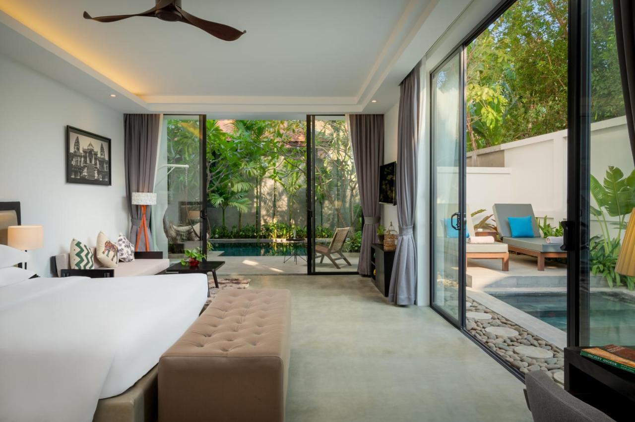 Eightfold Urban Resort 暹粒 外观 照片 A pool villa at The Village Phuket