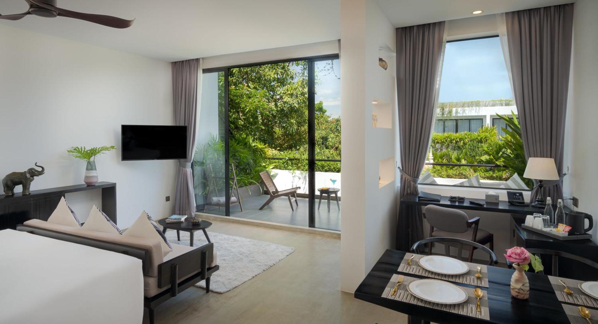 Eightfold Urban Resort 暹粒 外观 照片 A living room at the hotel